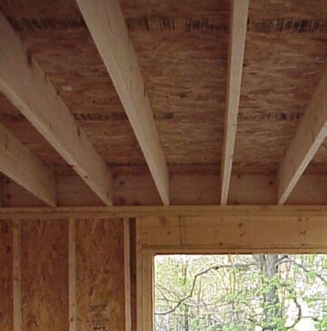 Lumber joists on rim board closeup