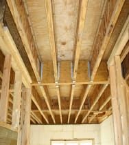 I-joists in hangers across LVL beam